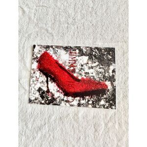 Jimmy Choo advertisement postcard with red, ruby slipper high heel ￼